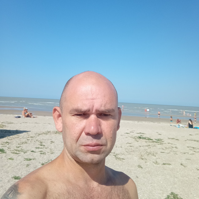 Ев